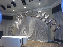 balloon arch with letters  