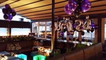 Black and white restaurant balloon decor